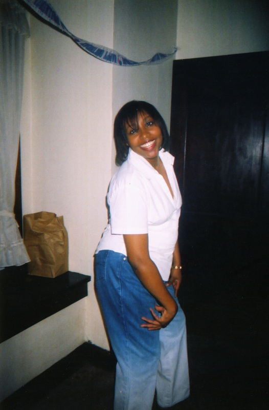 A woman smiles brightly for the camera at Soakie's.