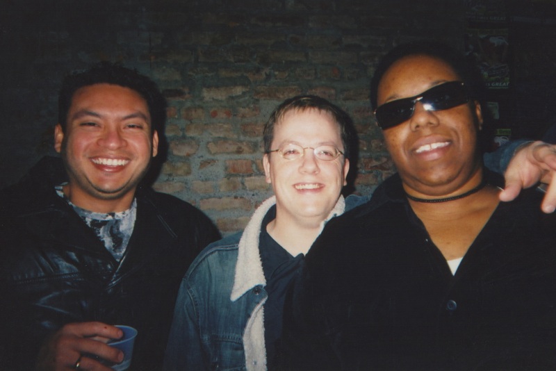 Three patrons of Soakie's smile to the camera.