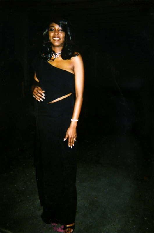 A patron of Soakie's smiles to the camera.