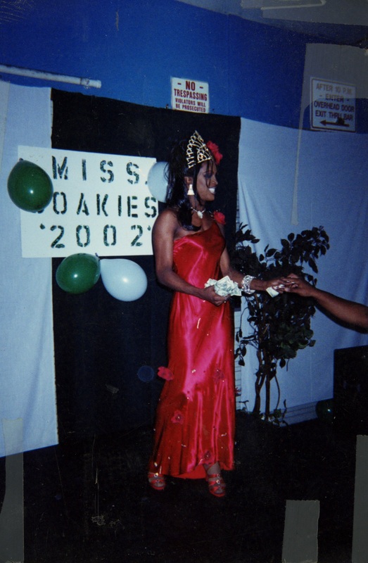 Treshawn Seymour smiles to the audience at "Miss Soakie's 2002".